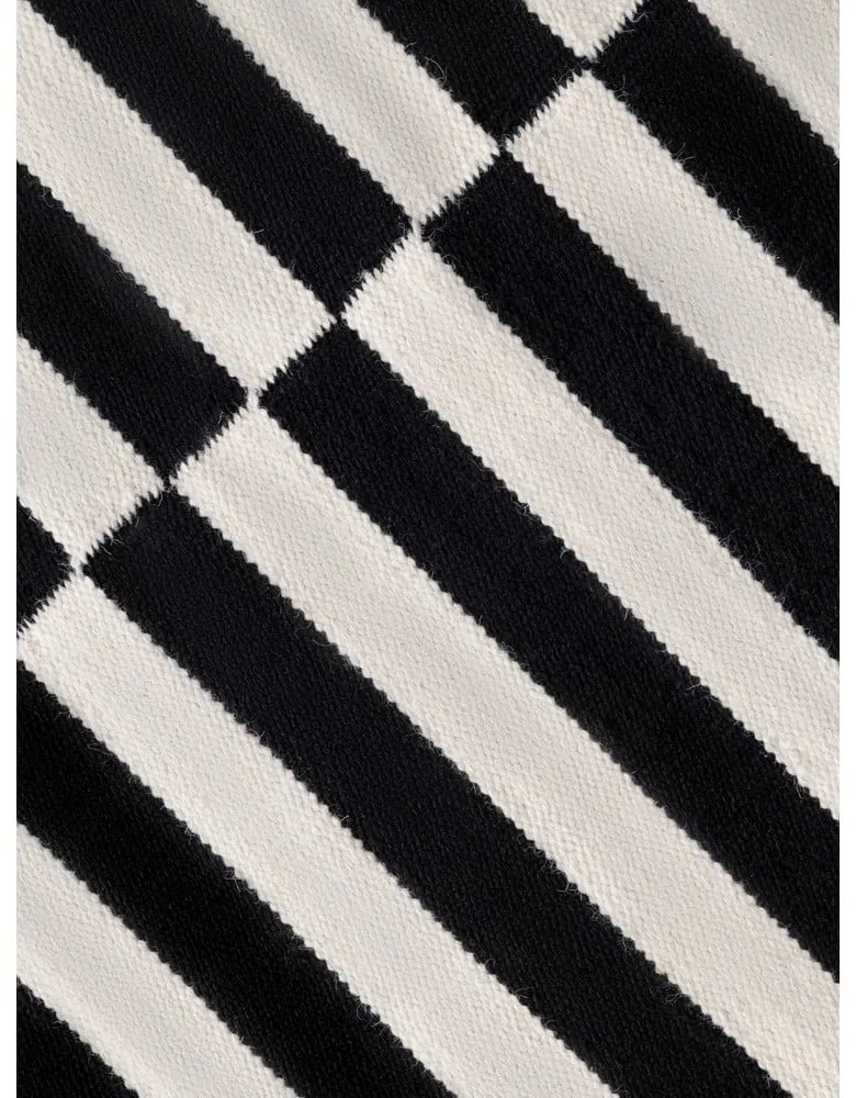 Черно-бял двустранен ръчно изработен вълнен килим 80x150 cm Donna – Hanse Home