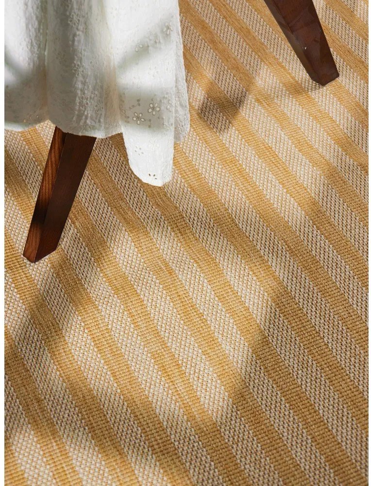 Килим за открито и закрито в цвят жълта охра/кремав 120x170 cm Haringey Linley – Ted Baker