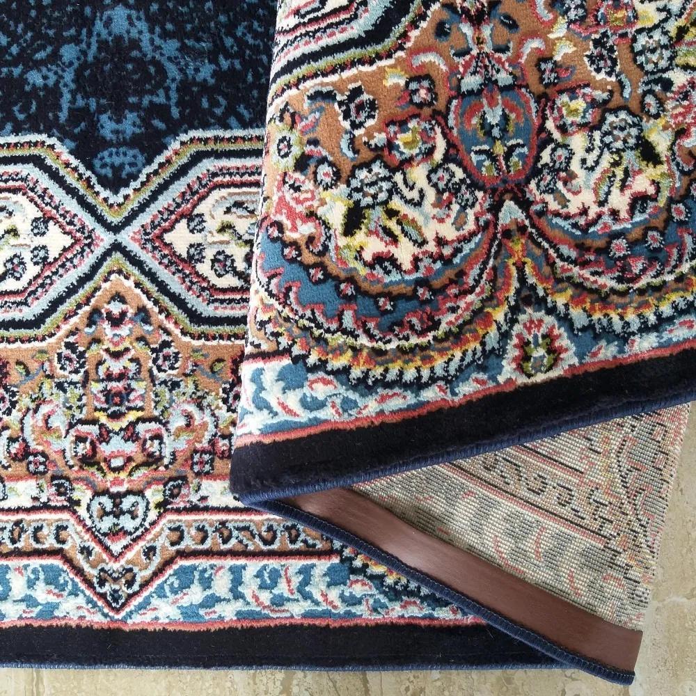 Луксозен син килим с красиви цветни детайли Ширина: 150 см | Дължина: 230 см