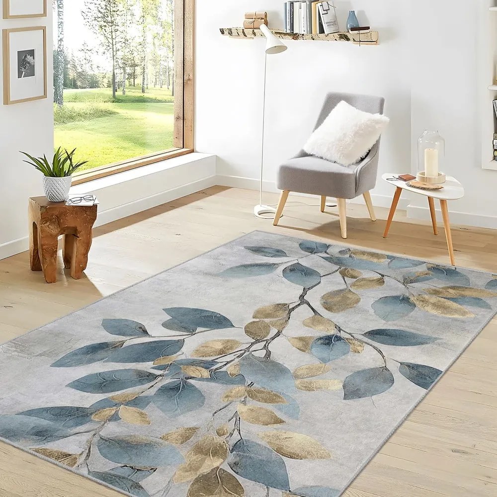 Светлосиньо-златист килим подходящ за пране 120x180 cm Golden Leaves – Mila Home