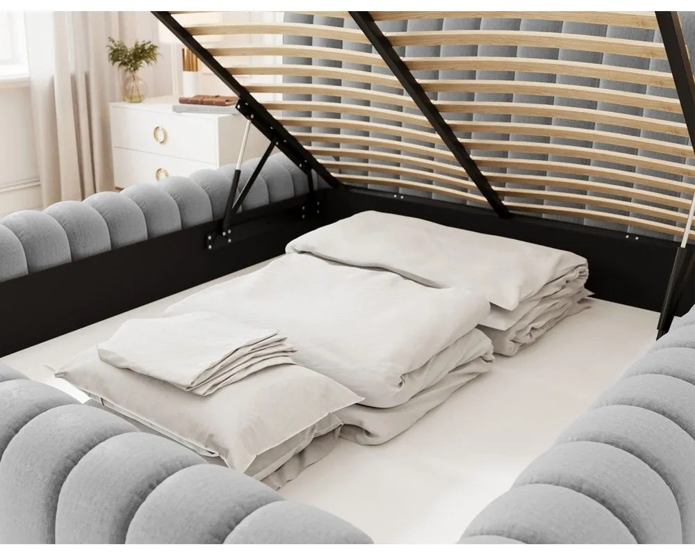 Светлосиво двойно тапицирано легло с място за съхранение и включена подматрачна рамка 160x200 cm Carilla – ELTAP