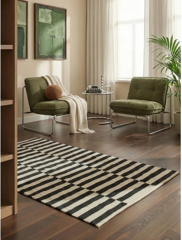 Черно-бял двустранен ръчно изработен вълнен килим 160x230 cm Donna – Hanse Home