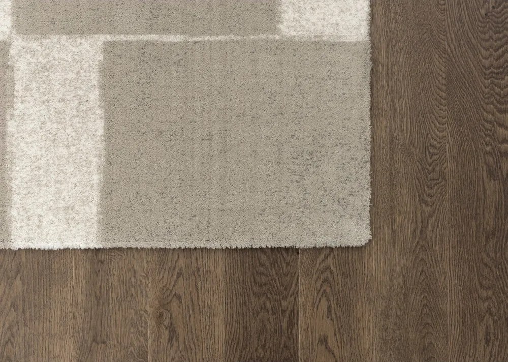 Сиво-бежов вълнен килим 133x190 cm Agnus Pavement – Agnella