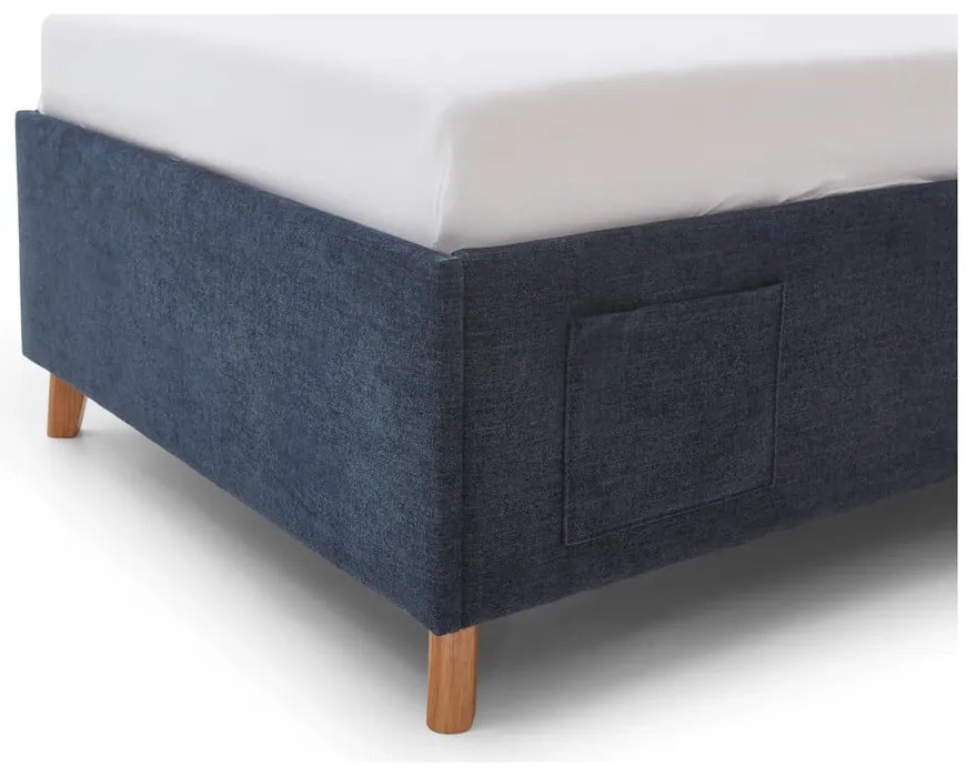 Тъмносиньо тапицирано детско легло 120x200 cm с място за съхранение с включена подматрачна рамка Fun – Meise Möbel