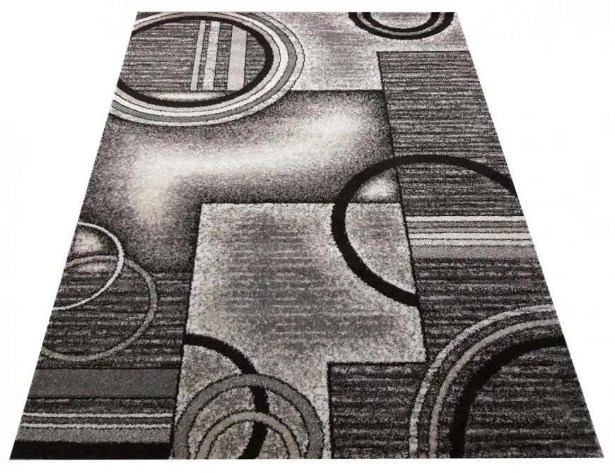 Модерен сиво-кафяв килим с абстрактни кръгове Ширина: 160 см | Дължина: 220 см