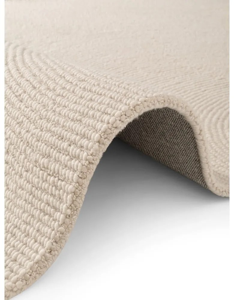 Ръчно изработен вълнен килим в светло естествен цвят 80x150 cm Calmio – Hanse Home