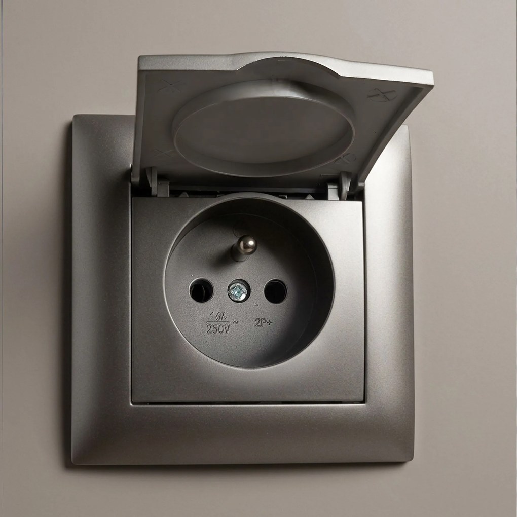 Единичен контакт със заземяване и капаче с рамка OSTE JNH005-G Grey