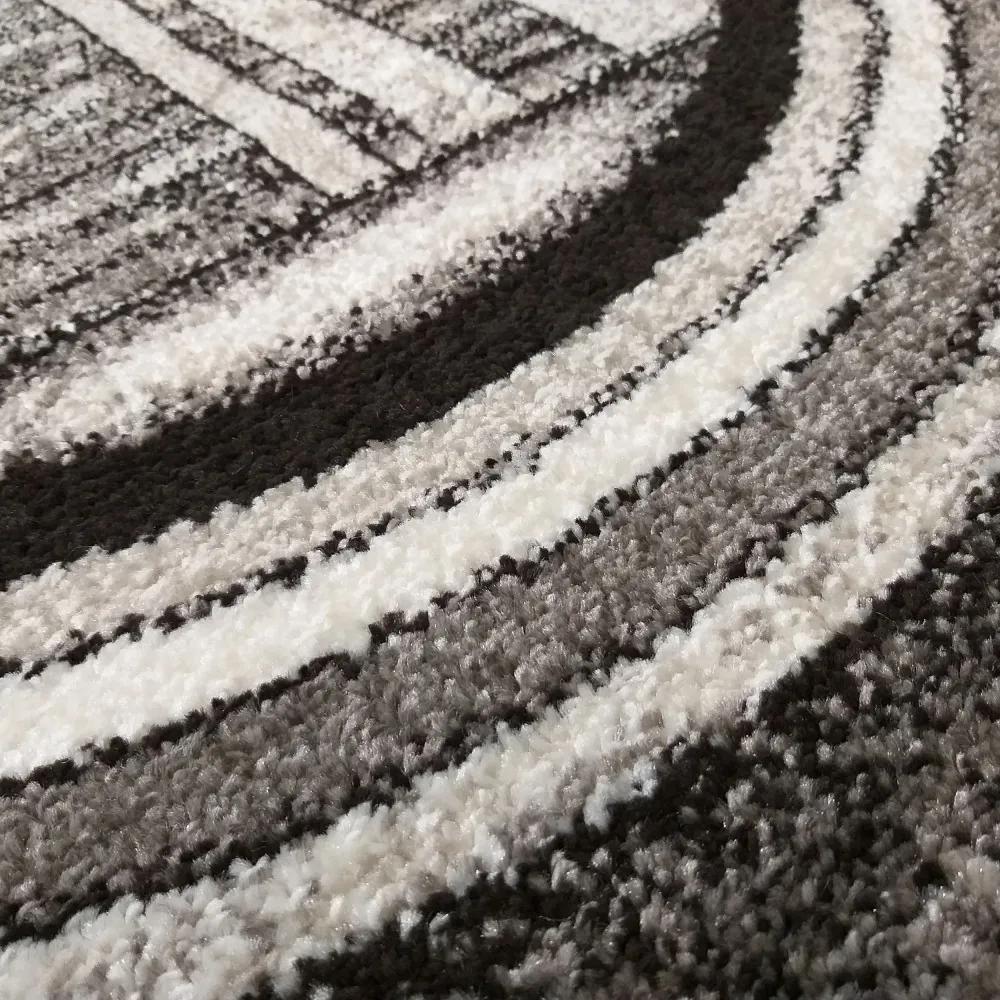 Модерен сиво-кафяв килим с абстрактни кръгове Ширина: 160 см | Дължина: 220 см