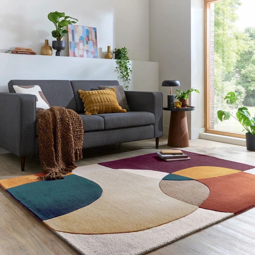 Лилав ръчно изработен вълнен килим 120x170 cm Glow Purple Multi – Flair Rugs