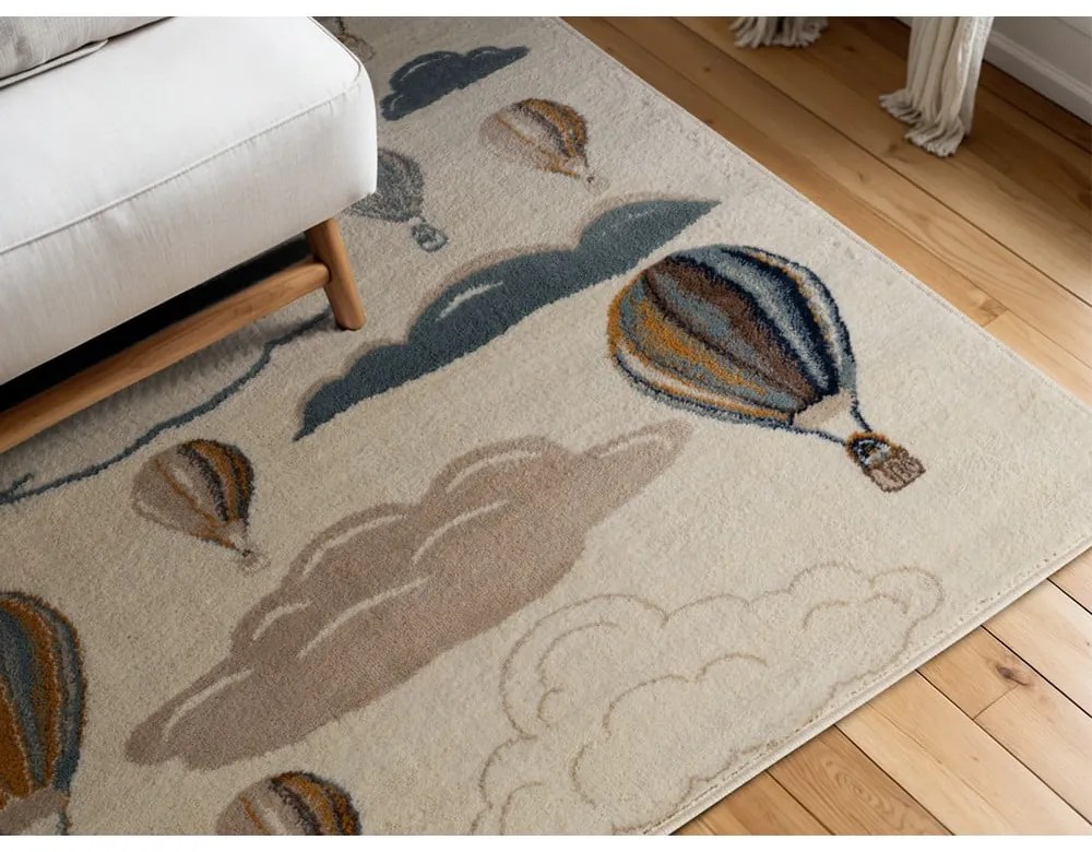 Кремав детски килим 120x170 cm Hot Air Balloon – Hanse Home