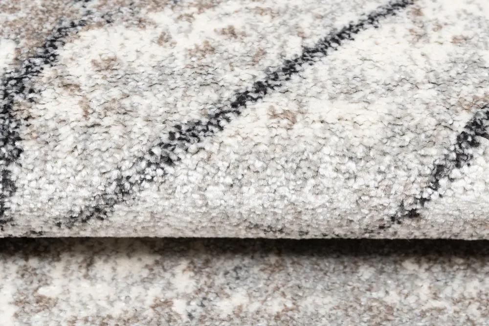 Модерен бежов килим с мотив от нежни листа Ширина: 80 см | Дължина: 150 см
