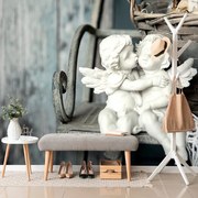 Фототапет – Фигурки на ангелчета на пейка