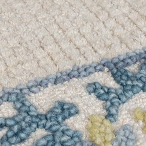 Ръчно изработен килим със смес от вълна в синьо и цвят слонова кост 120x170 cm Myla Floral Frame – Flair Rugs