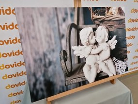 Картина на платно – Фигурки на ангелчета на пейка