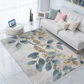 Светлосиньо-златист килим подходящ за пране 120x180 cm Golden Leaves – Mila Home