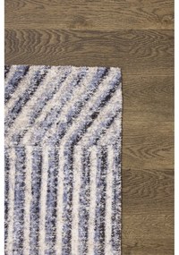 Светлосин вълнен килим 200x300 cm Strokes - Agnella