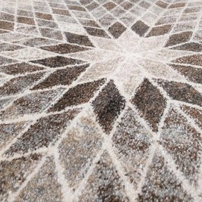 Бежов килим с естествени мотиви в модерен дизайн Ширина: 120 см | Дължина: 170 см