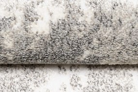 Дизайнерски килим с абстрактна шарка в кремаво Ширина: 120 см | Дължина: 170 см