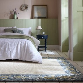 Ръчно изработен килим със смес от вълна в синьо и цвят слонова кост 120x170 cm Myla Floral Frame – Flair Rugs