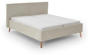 Кремаво тапицирано двойно легло с място за съхранение с включена подматрачна рамка 180x200 cm Riva – Meise Möbel