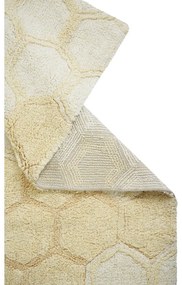 Ръчно изработен памучен килим подходящ за пране в цвят жълта охра 140x200 cm Sweet Honey – Lorena Canals