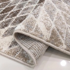 Бежов килим с естествени мотиви в модерен дизайн Ширина: 60 ​​см | Дължина: 100 см