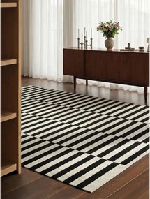 Черно-бял двустранен ръчно изработен вълнен килим 200x300 cm Donna – Hanse Home