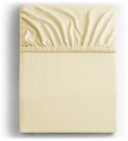 Кремав еластичен чаршаф от джърси 120x200 cm Amber – DecoKing