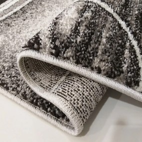Модерен сиво-кафяв килим с абстрактни кръгове Ширина: 80 см | Дължина: 150 см