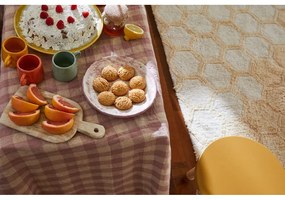 Ръчно изработен памучен килим подходящ за пране в цвят жълта охра 140x200 cm Sweet Honey – Lorena Canals