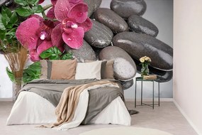 Фототапет – Цъфтяща орхидея и уелнес камъни