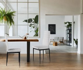 Комплект от 4 елегантни стола в бял цвят с вечен дизайн