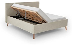 Кремаво тапицирано двойно легло с място за съхранение с включена подматрачна рамка 160x200 cm Riva – Meise Möbel