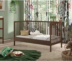 Кафяво детско креватче 70x140 cm от масивен бук с подвижна странична част/с регулируема височина Dino – Vipack