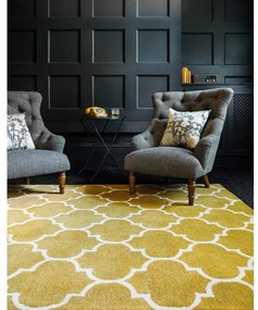 Ръчно изработен вълнен килим в цвят жълта охра 120x170 cm Albany – Asiatic Carpets